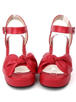 Red sweet lolita platform sandals front view flat lay featuring oversized decorative bow on toe cap peep-toe design and ankle metal buckle strap