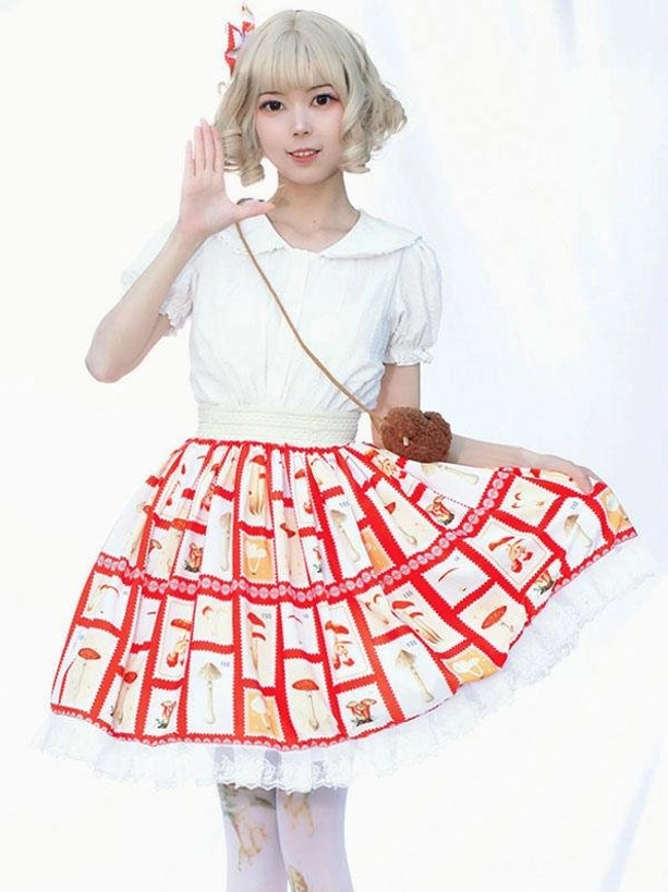 Red and white floral print Lolita skirt front three-quarter view with ruffled hem worn by model with blonde hair