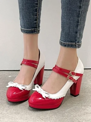 Red and white Lolita Mary Jane platform heels with dual ankle straps and bow trim, front overhead view showcasing glossy PU leather finish and round toe design