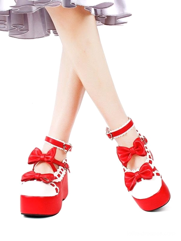 Red and white lolita platform shoes leg close-up with ruffled purple skirt red ankle straps bowknots