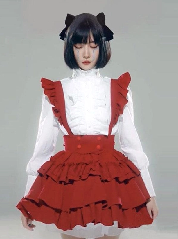 Red and white maid lolita two-piece dress worn by model with hair bows, showing how ensemble looks when styled on person in studio setting