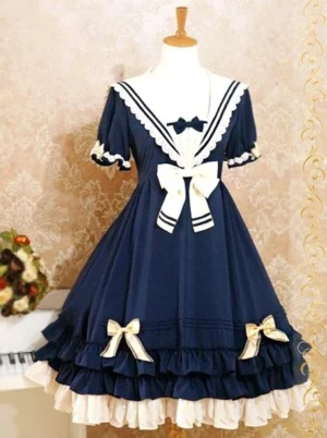 Rhine sailor sweet lolita one-piece dress navy blue front view on mannequin with tiered ruffle skirt and white lace trim