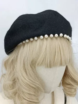 Black pearl Rococo Lolita beret side front view showing wool-like fuzzy texture and pearl brim decoration, vintage-inspired Lolita accessory