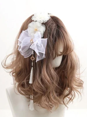 Burgundy Rococo Lolita headdress with lavender organza bow white fabric flowers tassel chain pendant back view on mannequin