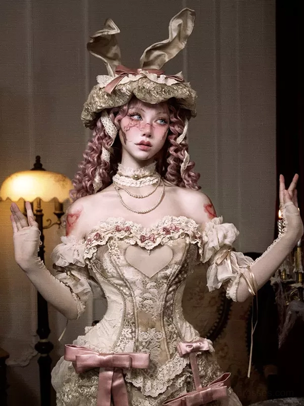 Rococo lolita ivory heart lace corset top boned bustier detail shot showing lace embellishment and construction