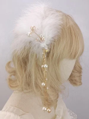 Rococo style lolita hair clip with fluffy white feathers and gold chain pearl tassel ornaments side view on blonde curly wig mannequin