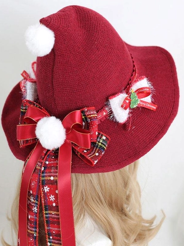 Rococo style lolita witch hat rear top view showing large plaid bow multiple white pom poms embellishments