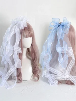 Rococo sweet lolita bow hair veil in light sky blue and white colors displayed on two mannequins side by side, featuring lace-trimmed tulle and large organza bows
