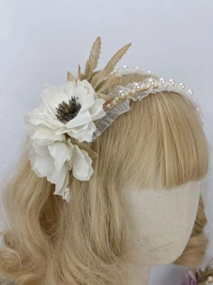 Off-white floral pearl Rococo Lolita headband with ruffled trim and brown leaf accents, displayed on blonde mannequin head in left side view
