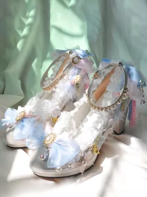 Rococo sweet lolita pumps front three-quarter view featuring white PU leather upper with blue organza bows, pearl embellishments, ruffled lace trim, chunky block heel platform