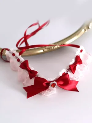 romantic-lace-choker-heart-gem-sweet-lolita-flat-lay-top-view-red-satin-bows-heart-gemstone-white-pink-frilled-lace-base-red-ribbon-tie-straps-lolita-neckwear