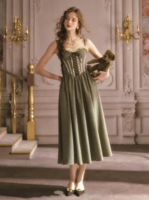 Sage green vintage corset fairy midi dress front lace-up sweet lolita full-body view with lace trim bust and A-line swing skirt on model in European palace setting