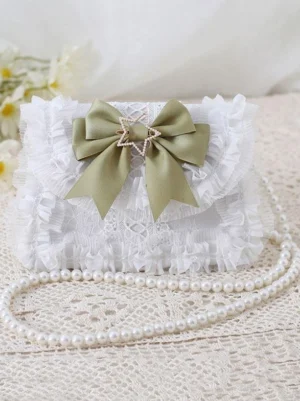 Sage green lolita crossbody bag with elegant satin bow, ruffled lace trim, star rhinestone ornament, and pearl shoulder strap