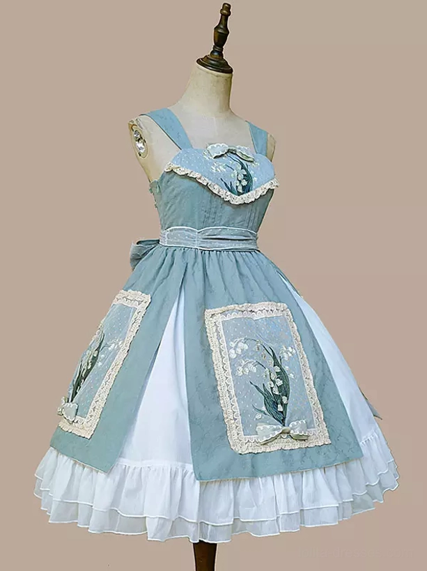 Front three-quarter mannequin view of sage green sweet lolita dress with lily of the valley embroidery and matching waist sash accent