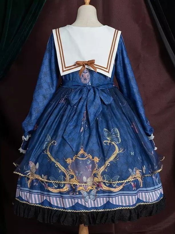 Sailor lolita one-piece dress hem detail with layered lace ruffles, vintage print, and construction quality of Academic Lolita OP