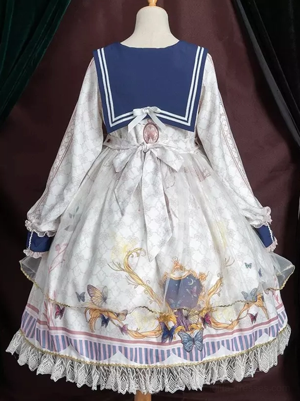 Sailor lolita one-piece dress waist and bow detail showing construction quality, front bow decoration, and refined craftsmanship