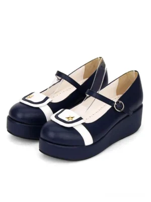 Sailor-style lolita two-tone flatform pumps with navy-blue and white color blocking, gold star ornament on toe cap, Mary Jane buckle strap, oblique side top view on white background