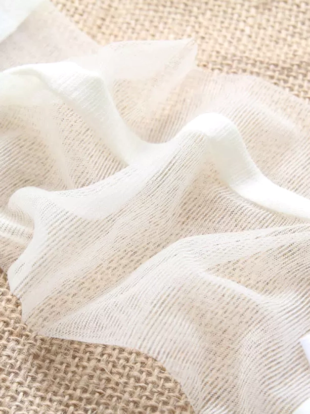 sheer lolita stocking fabric texture flat lay off-white mesh lightweight poly cotton blend material detail
