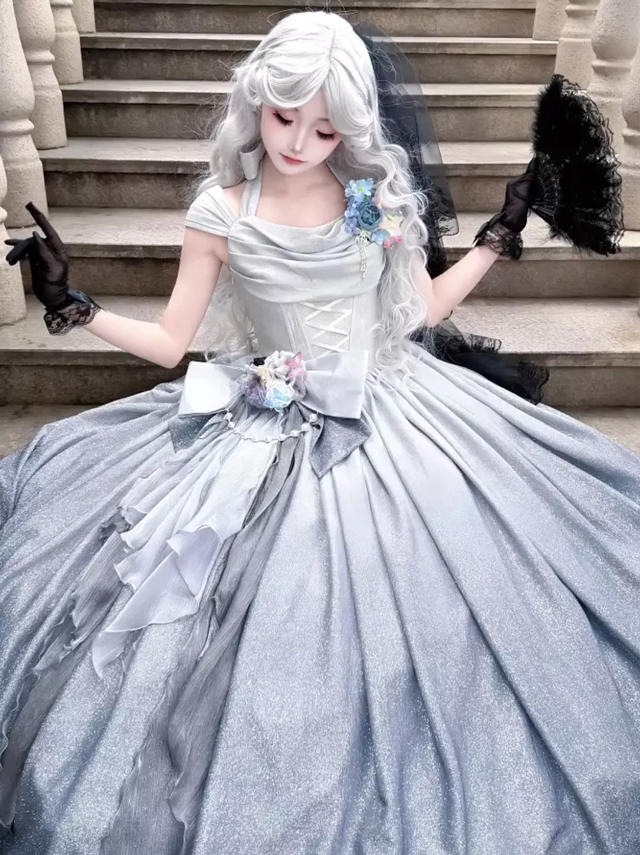 Silver glitter sweet lolita dress low front side view lace-up bodice full skirt model holding feather fan looking down elegant formal wear