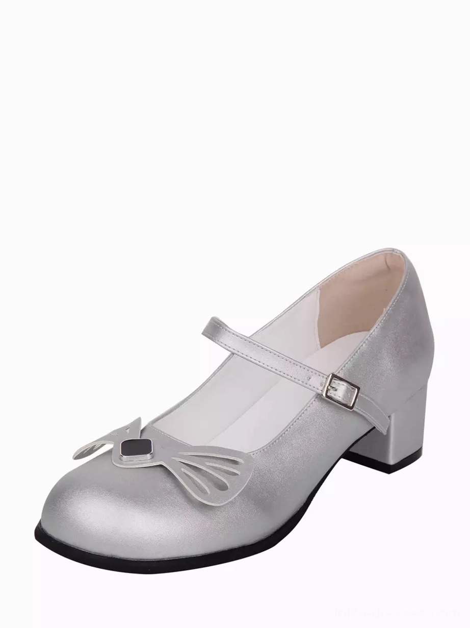 Single silver Lolita Mary Jane pump displayed in left front three-quarter view showing hollow toe bow, adjustable ankle strap buckle, and polished PU leather finish