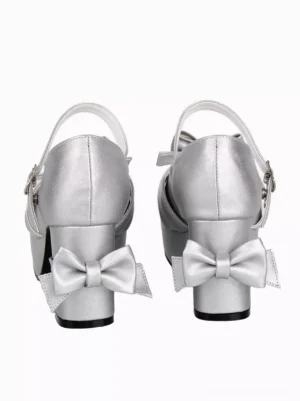 silver lolita pumps rear view displaying large decorative heel bow and metal buckle ankle strap with polished finish