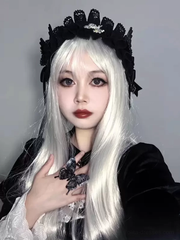 Silver-white long straight Lolita wig with air bangs featuring black lace Gothic hair crown, front half-body styling view