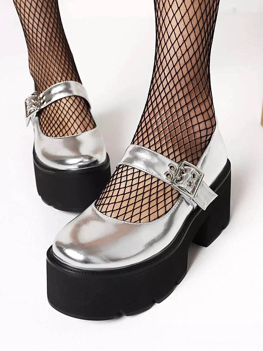 Silver shiny patent platform Mary Jane lolita shoes front view on model wearing fishnet stockings with thick black platform heel detail
