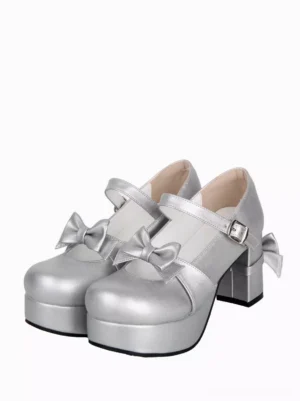 silver sweet lolita platform pumps with dual bows front three quarter view showing round toe and adjustable ankle strap with metal buckle detail