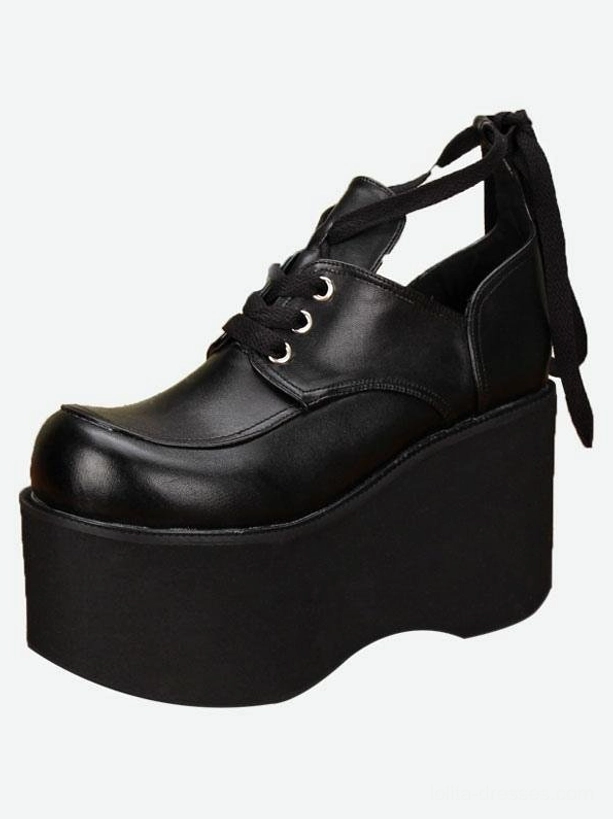 Single black gothic platform lolita shoe left oblique front view displaying lace-up construction back ribbon strap high wedge platform