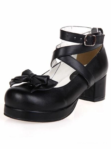Single black lolita platform heel three-quarter front view displaying round toe, decorative front bow, cross ankle buckle straps, and mid-height chunky heel