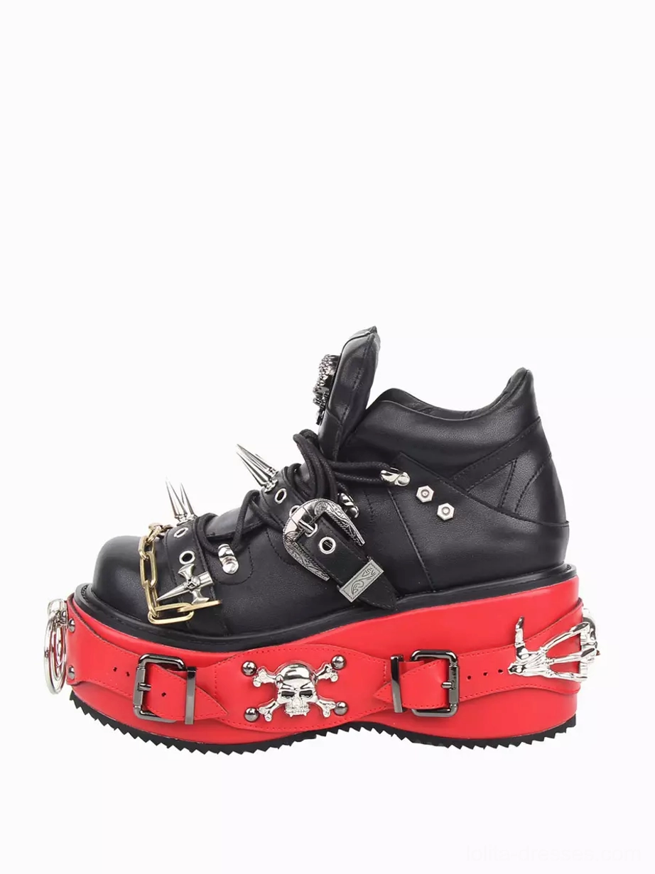 Single gothic lolita punk platform ankle boot side-front close-up view black leather upper with prominent red thick sole and metal spike decoration details