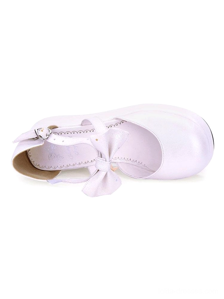 Single white Lolita platform shoe lateral flat lay view showing scalloped inner edge ankle strap buckle design