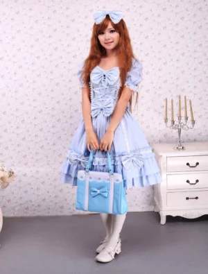 sky blue lolita dress front pose sweetheart neckline central bow decorative lace trim short puffed sleeves