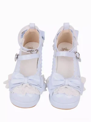 Light sky blue lolita pumps front view featuring large front bow scalloped lace trim heart-shaped ankle buckles round toe design