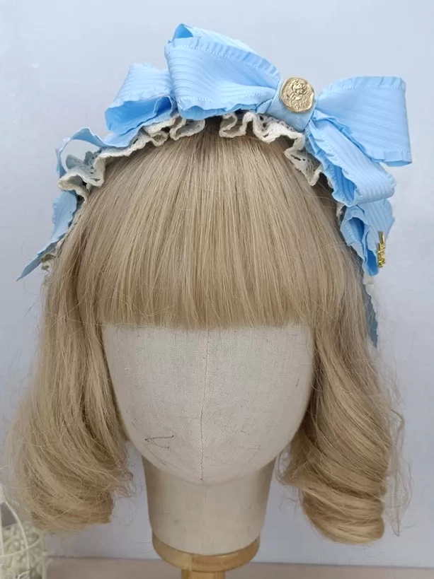 Sky blue striped lolita bow hairband with beige ruffled edge and gold brooch on mannequin - sweet lolita rococo headwear accessory