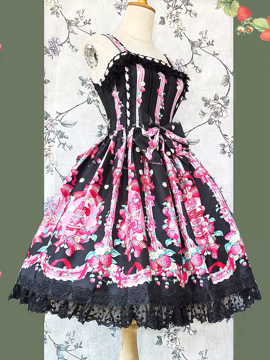 Sleeveless sweet lolita dress front view on dress form with black base and pink strawberry floral print, lace-trimmed hem, spaghetti straps, waist bowknot, and floral wallpaper background