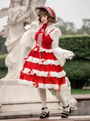 Sleeveless lolita dress front view lace-up bodice white under-blouse ruffled cuffs garden outdoor setting