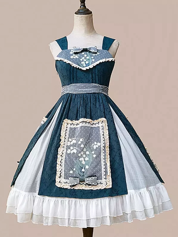 Sleeveless lolita jumper dress on mannequin with dark teal and white color scheme, bow trim, and lace-trimmed embroidery panels front view