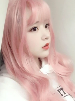 pastel pink lolita wig left side profile loose wavy texture neat bangs sweet lolita fashion wig