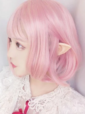 soft pink short lolita wig light pink bob cut synthetic hair blunt bangs sweet lolita aesthetic left side view