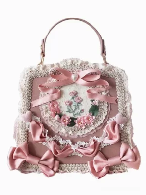 Dusty pink square sweet lolita PU leather handbag with pink satin bows lace trims floral embroidery flat lay