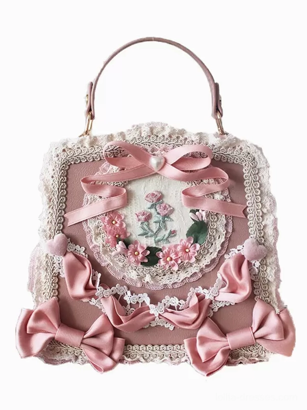 Dusty pink square sweet lolita PU leather handbag with pink satin bows lace trims floral embroidery flat lay