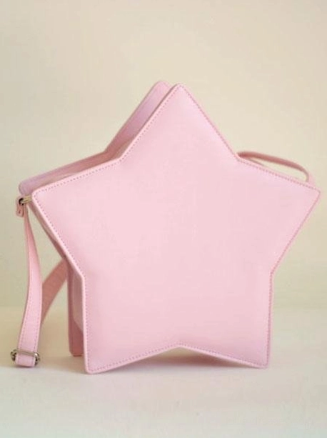 Star-shaped lolita crossbody bag interior compartment view showing spacious storage capacity and zipper closure with matching thread color details
