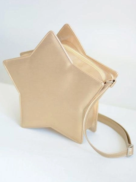 Star-shaped lolita crossbody bag worn crossbody style lifestyle shot demonstrating adjustable strap fit and practicality for sweet lolita coordinates