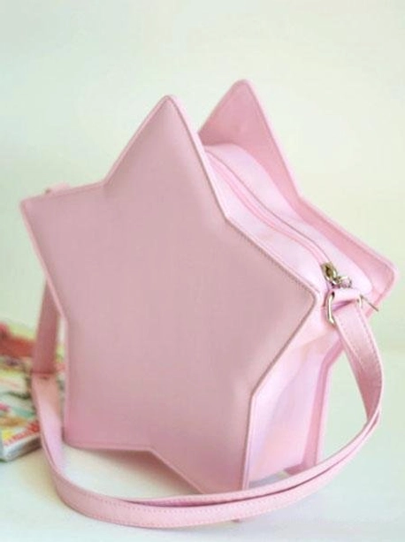Star-shaped lolita crossbody bags styled flat lay arrangement showcasing color coordination possibilities with lolita fashion accessories and aesthetics