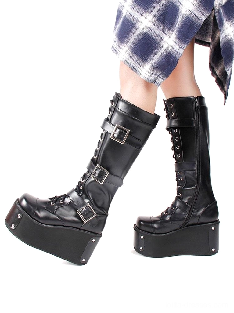 Black steampunk gothic knee-high boots side flat view showing buckle straps lace-up design and thick wedge platform sole with metal corner studs