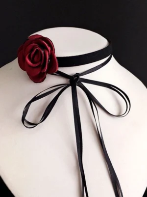 Steampunk Gothic Lolita velvet choker with wine red fabric rose and black satin bow ties, front close-up view on white mannequin neck display
