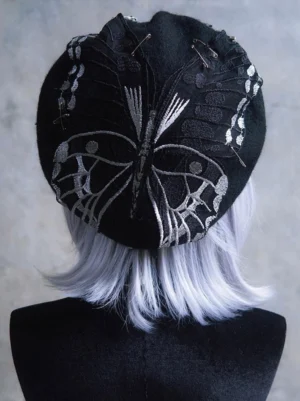 Steampunk lolita beret hat back view black felt with silver butterfly embroidery safety pins leather trim