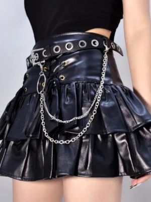 punk lolita chain sash side view model wearing black cropped top ruffled leather skirt steampunk