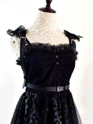 Black PU leather steampunk lolita chest harness with silver buckles and ruffled lace details on mannequin wearing black camisole